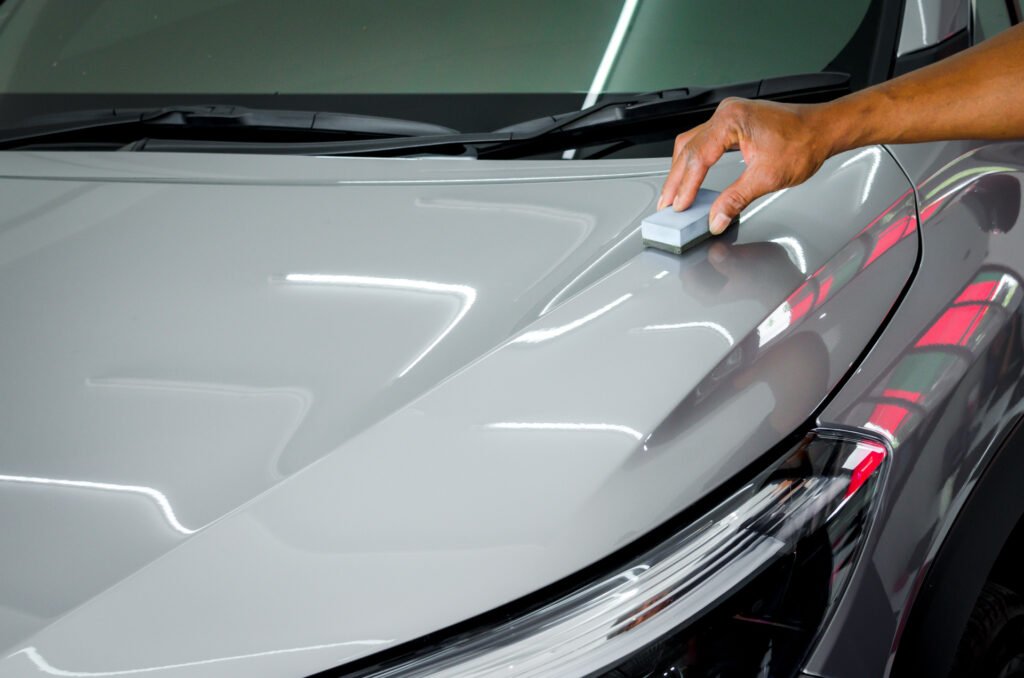 medium vecteezy polishing the top of a car 1965846 medium