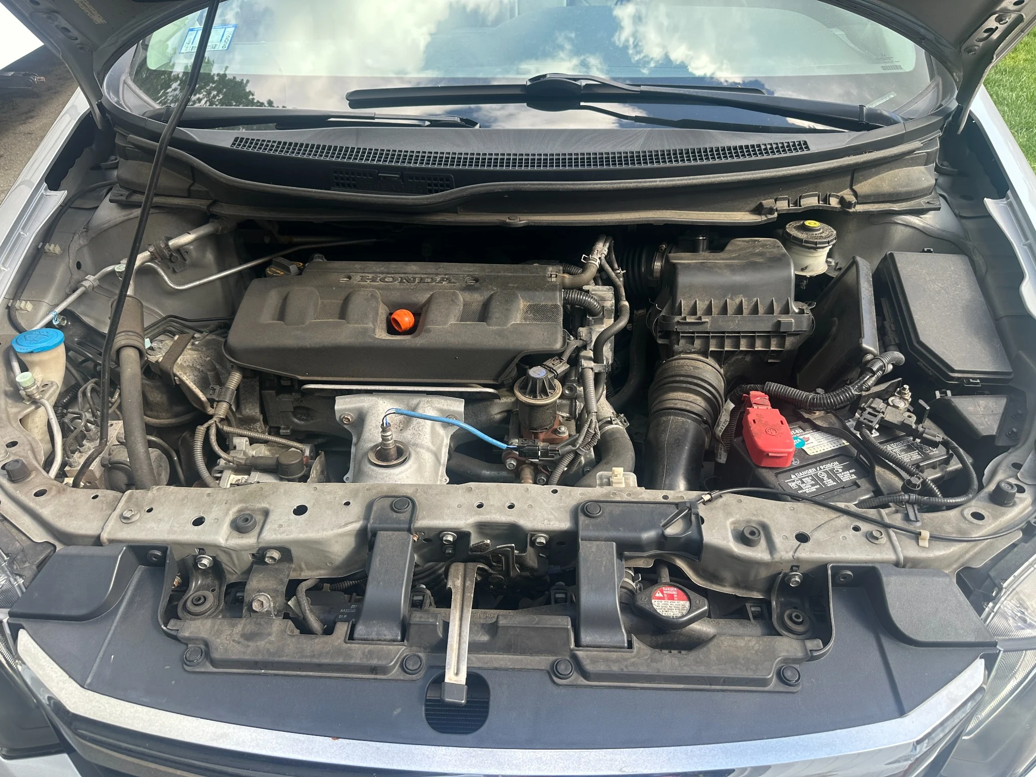 Before engine detailing – Subaru engine bay with dirt and dust in Stoneham MA
