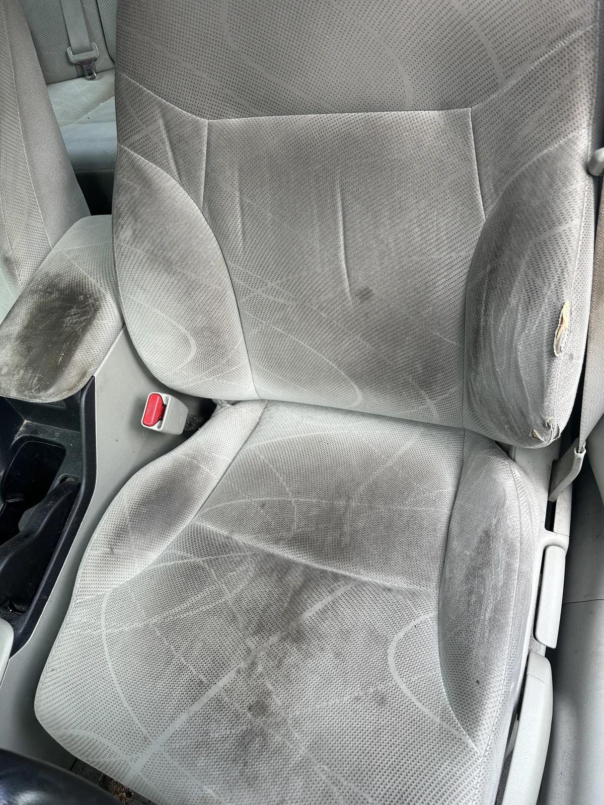Dirty cloth seats before interior detail — Stoneham MA