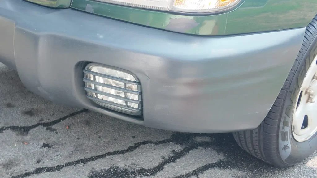 Faded grey plastic trim before restoration in [tmc_town] MA