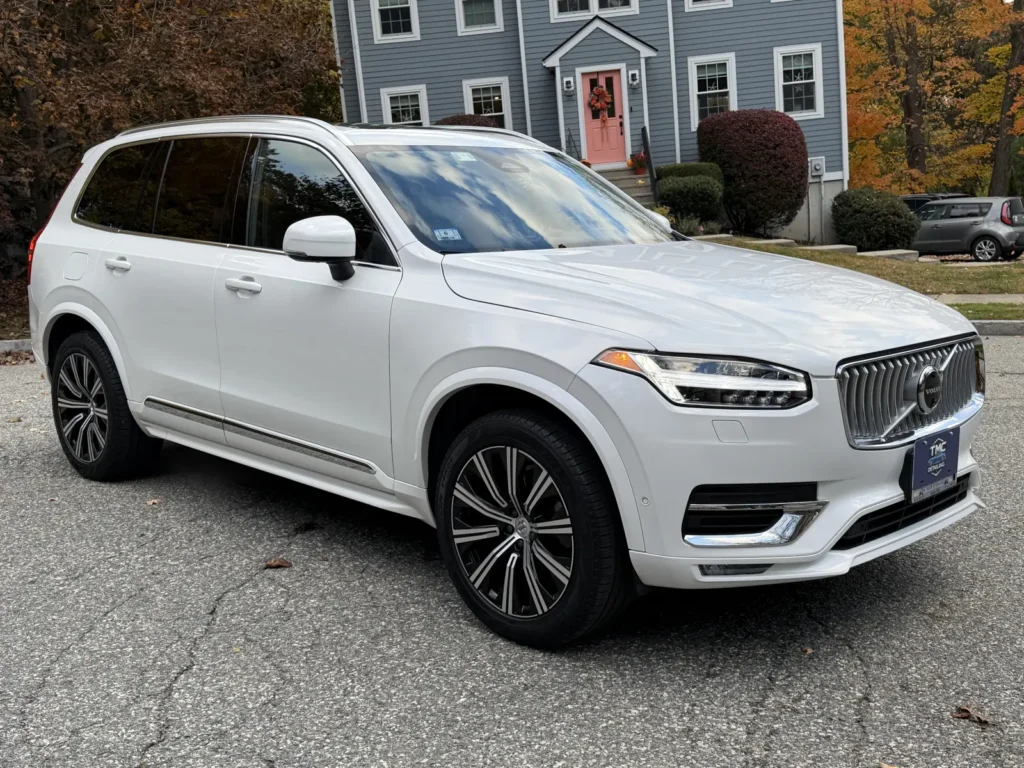 White Volvo XC90 after ceramic coating showing deep gloss and reflection